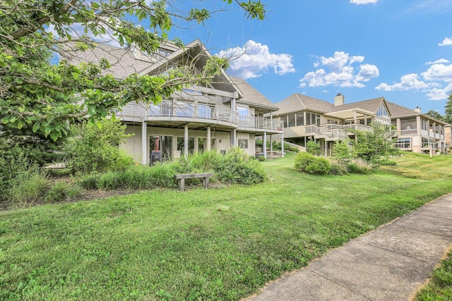 2405 Prairieridge Pl, Champaign, IL 61822 - back of house with a yard
