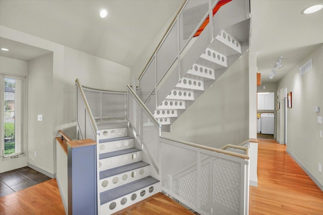 2405 Prairieridge Pl, Champaign, IL 61822 - stairway with wood finished floors, washer / clothes dryer, and recessed lighting