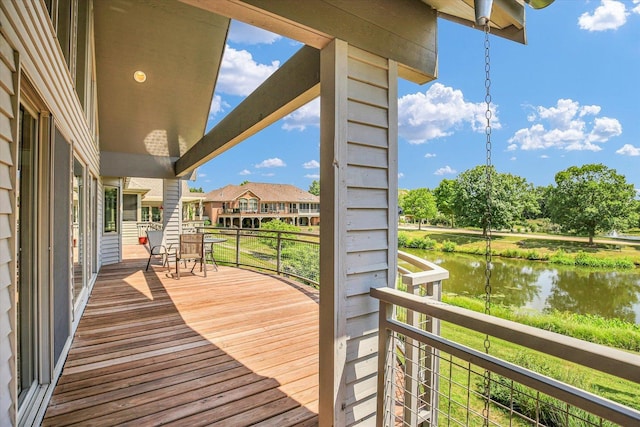 2405 Prairieridge Pl, Champaign, IL 61822 - wooden deck with a water view