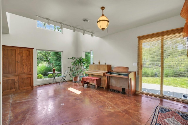 2405 Prairieridge Pl, Champaign, IL 61822 - foyer entrance featuring track lighting and concrete flooring