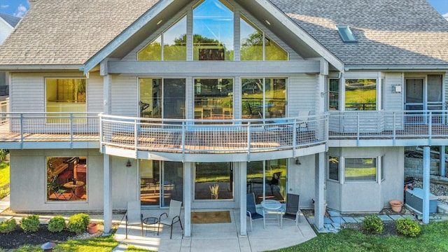 2405 Prairieridge Pl, Champaign, IL 61822 - back of house with roof with shingles, a patio, and a balcony