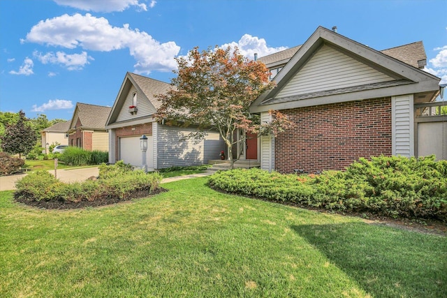2405 Prairieridge Pl, Champaign, IL 61822 - traditional-style home with a garage, brick siding, a front yard, an outdoor structure, and concrete driveway