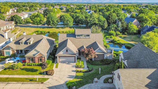 2405 Prairieridge Pl, Champaign, IL 61822 - aerial perspective of suburban area with a large body of water