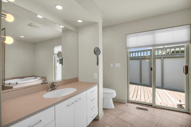 2405 Prairieridge Pl, Champaign, IL 61822 - bathroom with vanity, tile patterned floors, a garden tub, and recessed lighting