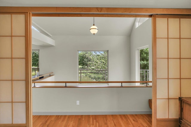2405 Prairieridge Pl, Champaign, IL 61822 - hallway with wood finished floors and plenty of natural light