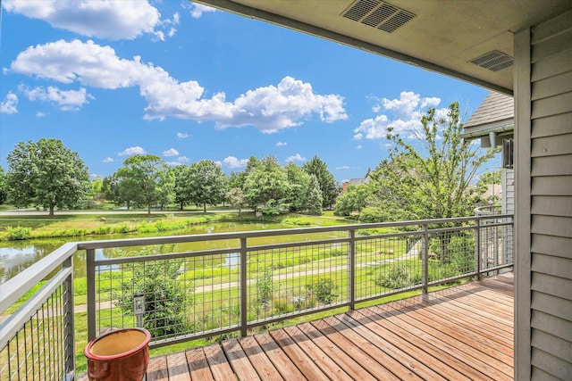 2405 Prairieridge Pl, Champaign, IL 61822 - deck featuring a water view and view of wooded area