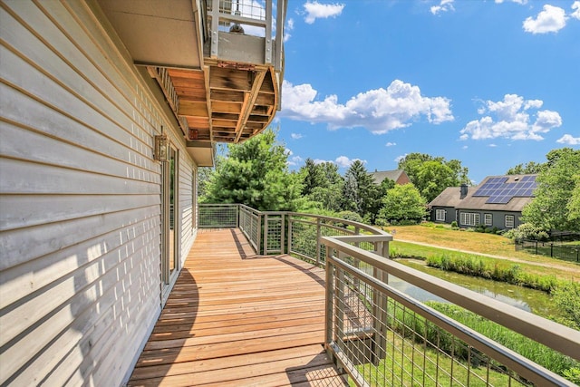 2405 Prairieridge Pl, Champaign, IL 61822 - wooden deck with a water view