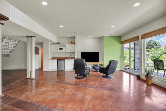 2405 Prairieridge Pl, Champaign, IL 61822 - office area featuring wet bar, recessed lighting, and decorative columns
