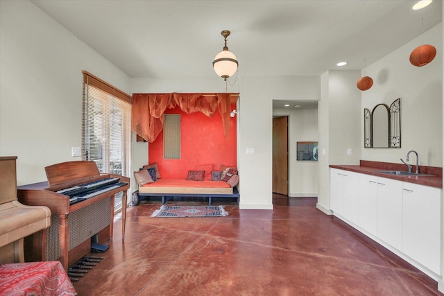 2405 Prairieridge Pl, Champaign, IL 61822 - sitting room featuring finished concrete flooring and recessed lighting