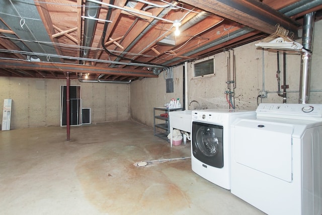 2114 Country Knoll Ln, Elgin, IL 60123 - unfinished below grade area featuring washing machine and dryer and a sink