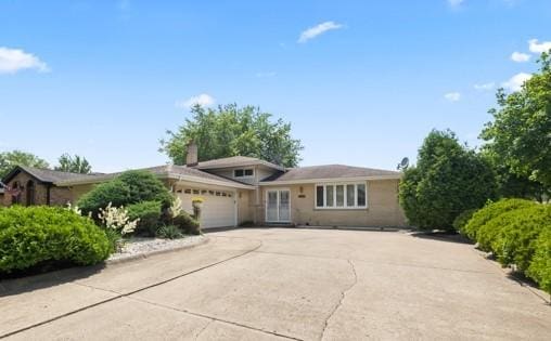 500 S Princeton Ave, Itasca, IL 60143 - view of front of property with an attached garage and concrete driveway