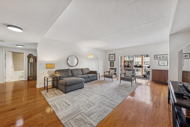 400 Mcdaniels Cir Unit 303, Clarendon Hills, IL 60514 - living area featuring wood finished floors and arched walkways