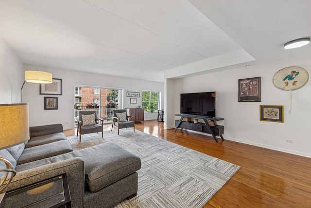 400 Mcdaniels Cir Unit 303, Clarendon Hills, IL 60514 - living room with wood finished floors and baseboards