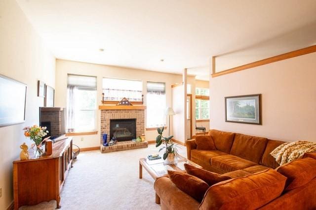 9000 226th Ct Unit 23B, Salem, WI 53168 - living area featuring a fireplace and carpet flooring