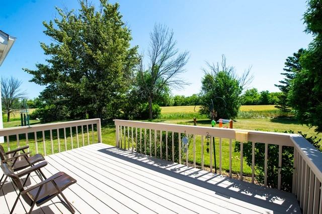 9000 226th Ct Unit 23B, Salem, WI 53168 - deck with a lawn