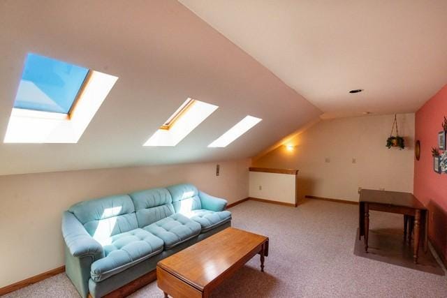 9000 226th Ct Unit 23B, Salem, WI 53168 - bonus room featuring a skylight, lofted ceiling, and light carpet