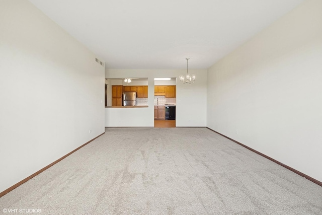 5225 N Riversedge Ter Unit 511, Chicago, IL 60630 - unfurnished living room featuring a chandelier and light colored carpet