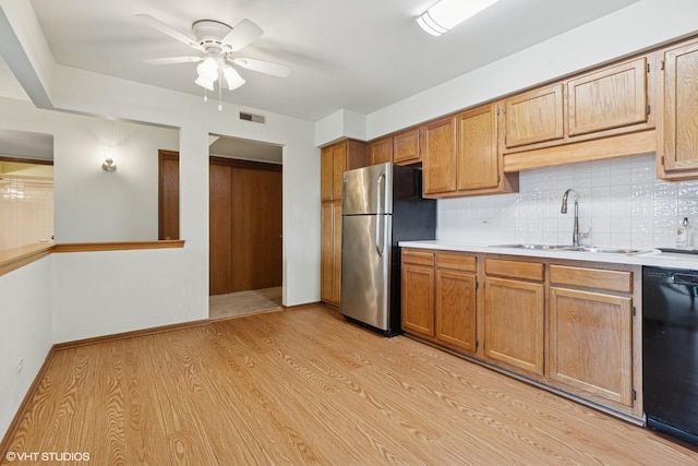 5225 N Riversedge Ter Unit 511, Chicago, IL 60630 - kitchen featuring freestanding refrigerator, dishwasher, a ceiling fan, and light countertops