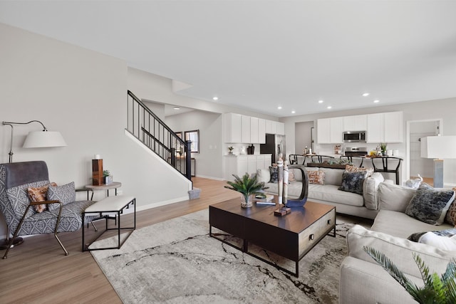 614 Lismore Cir, Elgin, IL 60124 - living area featuring light wood-type flooring, stairs, and recessed lighting