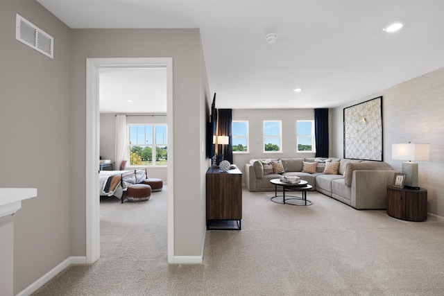 614 Lismore Cir, Elgin, IL 60124 - carpeted living area featuring baseboards and recessed lighting