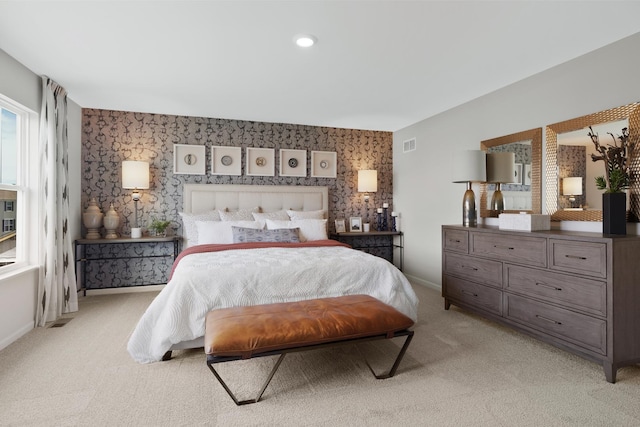 614 Lismore Cir, Elgin, IL 60124 - bedroom with an accent wall, wallpapered walls, and light colored carpet