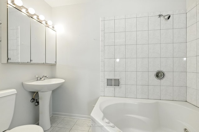 7003 W Carol Ave, Niles, IL 60714 - full bath with toilet and tile patterned flooring