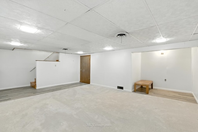 7003 W Carol Ave, Niles, IL 60714 - finished basement with carpet flooring, stairway, and a drop ceiling