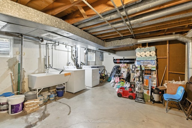 7003 W Carol Ave, Niles, IL 60714 - below grade area featuring a sink and washer and clothes dryer