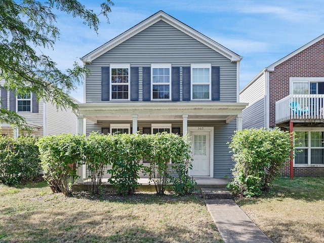 365 Lakewood Blvd, Park Forest, IL 60466 - traditional-style home with a porch and a front lawn