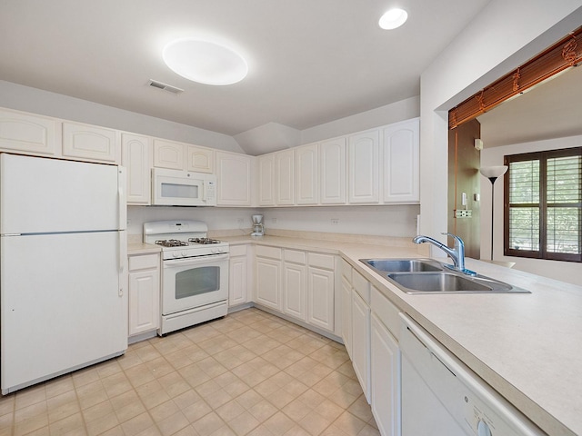 365 Lakewood Blvd, Park Forest, IL 60466 - kitchen featuring white appliances, white cabinetry, light countertops, and lofted ceiling