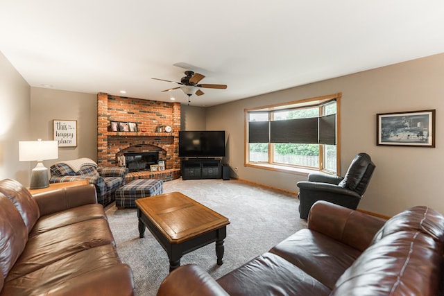 1132 Swanberg Ct, Sycamore, IL 60178 - living area featuring light colored carpet, ceiling fan, and a fireplace