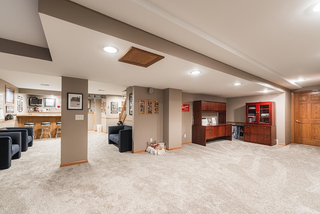 1132 Swanberg Ct, Sycamore, IL 60178 - living room featuring light carpet, recessed lighting, and bar