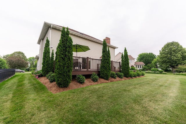 1132 Swanberg Ct, Sycamore, IL 60178 - view of property exterior featuring a wooden deck and a chimney
