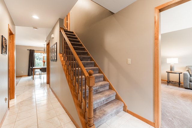 1132 Swanberg Ct, Sycamore, IL 60178 - staircase featuring tile patterned flooring and baseboards