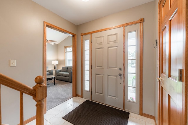 1132 Swanberg Ct, Sycamore, IL 60178 - entryway with healthy amount of natural light, light tile patterned floors, light carpet, and lofted ceiling