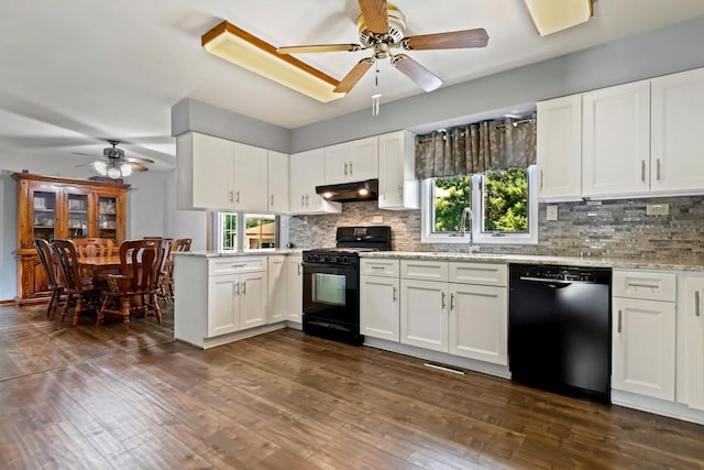 17257 W Rich Ct, Elwood, IL 60421 - kitchen featuring black appliances, ceiling fan, under cabinet range hood, and tasteful backsplash