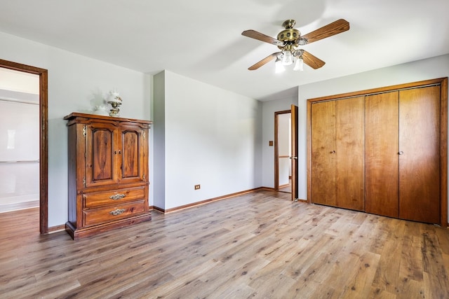 17257 W Rich Ct, Elwood, IL 60421 - unfurnished bedroom featuring light wood-style flooring, a closet, and ceiling fan