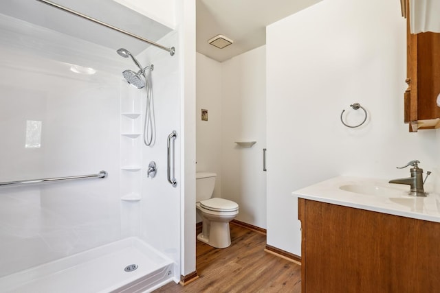 17257 W Rich Ct, Elwood, IL 60421 - full bathroom with wood finished floors, vanity, and a shower
