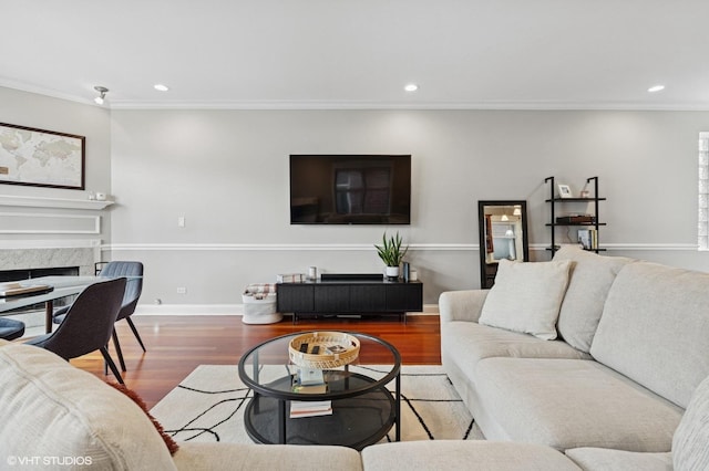 2438 N Clybourn Ave Unit 2, Chicago, IL 60614 - living area with ornamental molding, wood finished floors, recessed lighting, and a high end fireplace