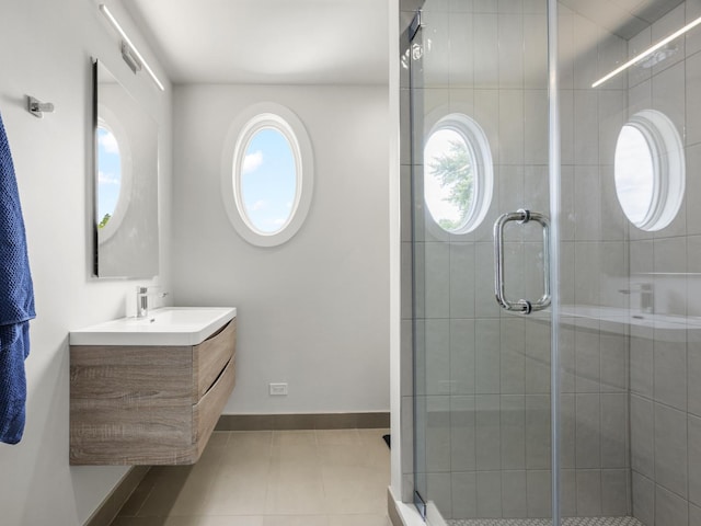 239 7th Ave, La Grange, IL 60525 - full bathroom with vanity, tile patterned floors, and a stall shower