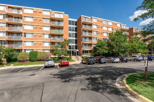 2201 S Stewart Ave Unit 4J, Lombard, IL 60148 - view of apartment building / complex with uncovered parking