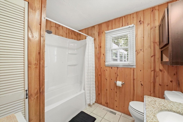 2425 Lockner Blvd, Joliet, IL 60431 - bathroom featuring wood walls, tile patterned flooring, shower / tub combo, and vanity
