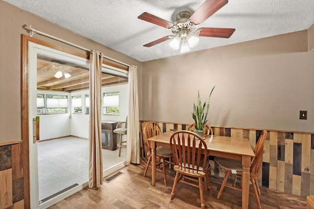 2425 Lockner Blvd, Joliet, IL 60431 - dining space featuring a ceiling fan, wood finished floors, and a textured ceiling