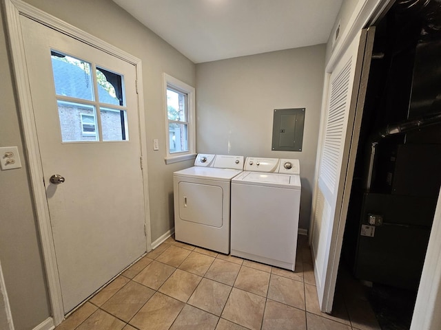 623 Westmoreland Ave, Waukegan, IL 60085 - washroom featuring electric panel, washing machine and dryer, and light tile patterned flooring