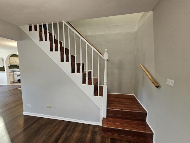 623 Westmoreland Ave, Waukegan, IL 60085 - staircase with arched walkways and wood finished floors