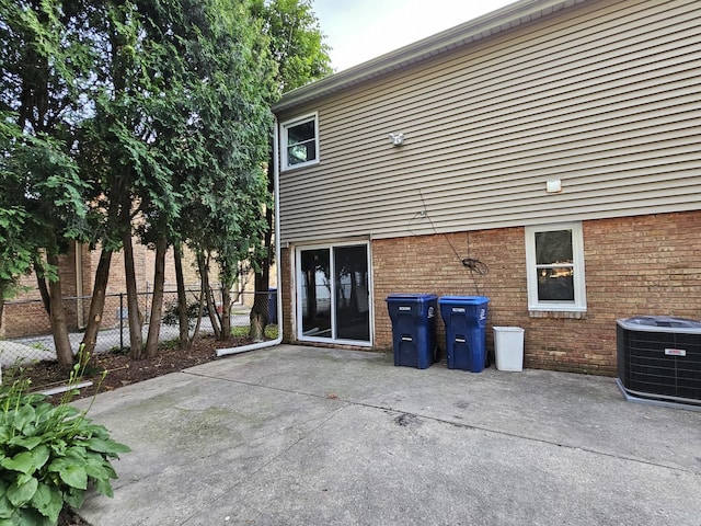 623 Westmoreland Ave, Waukegan, IL 60085 - back of property with brick siding and a patio