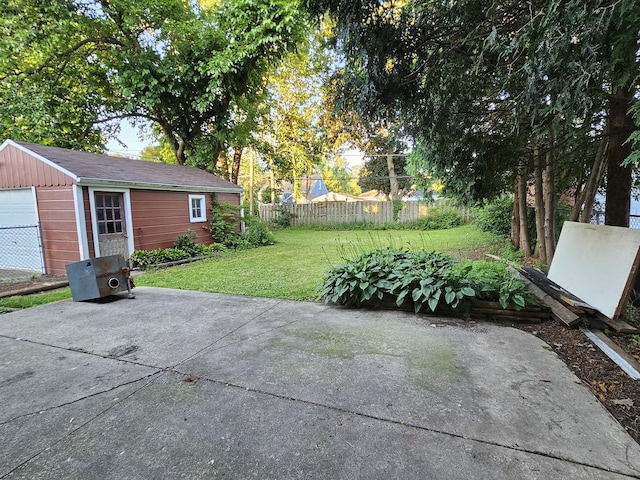 623 Westmoreland Ave, Waukegan, IL 60085 - view of patio with an outbuilding