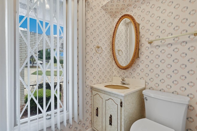 712 Ridge Rd, Lemont, IL 60439 - bathroom featuring wallpapered walls and vanity