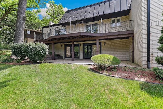 712 Ridge Rd, Lemont, IL 60439 - back of property featuring brick siding, a lawn, and a wooden deck