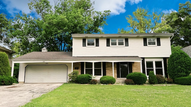2931 Sunset Ave, Flossmoor, IL 60422 - view of front of home with a garage, a front lawn, driveway, a porch, and brick siding